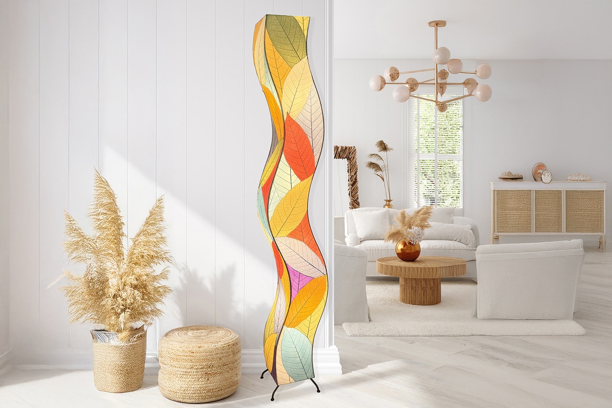 Handmade colorful floor lamp with a vibrant leaf design illuminating a minimalist living room.