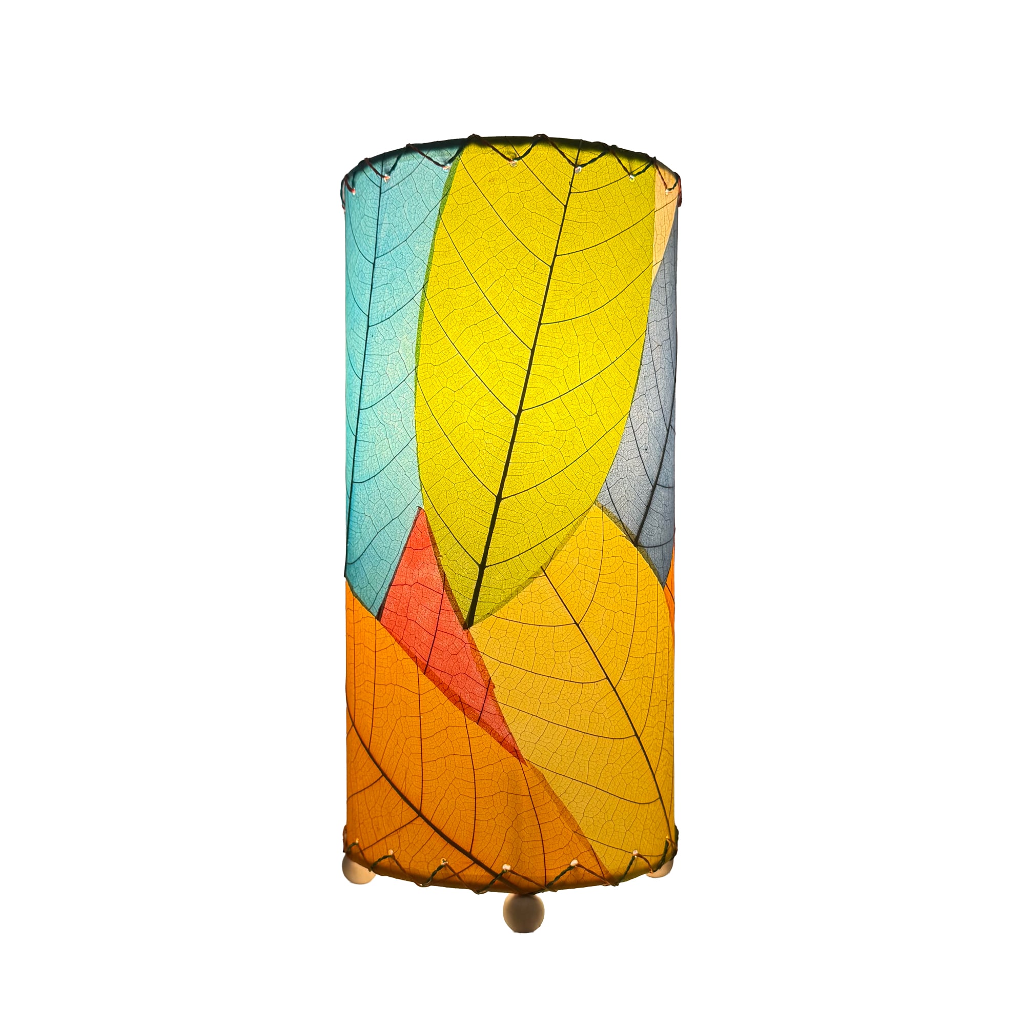 Eangee Home Design 380 Series Multi table lamp variation showcasing a different angle of the colorful patchwork leaf design in purple, red, yellow, and gray tones on a white studio background.