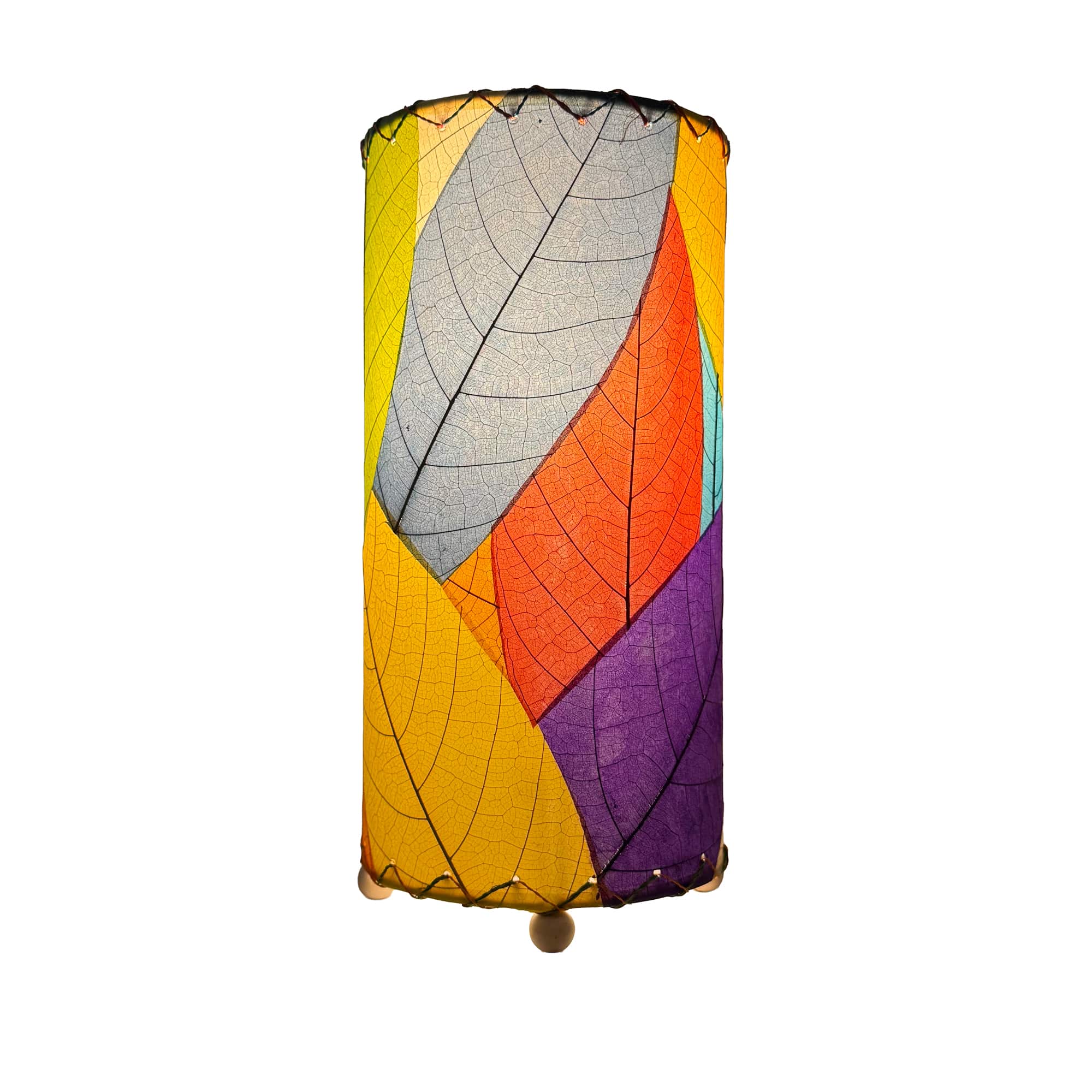 Eangee Home Design 380 Series Multi table lamp featuring overlapping panels of yellow, orange, blue, and green leaves, photographed on white background to accentuate vibrant artisan colorwork.