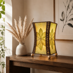 Biophilic design at home with a handcrafted green leaf table lamp, warm lighting, wood texture, and natural décor